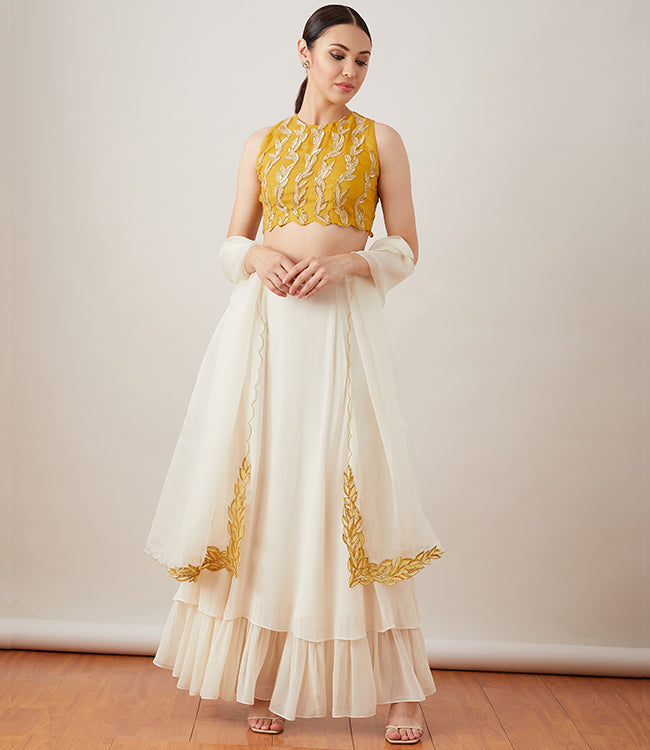 Kanishka Ahuja in MUSTARD APPLIQUE LEHENGA SET